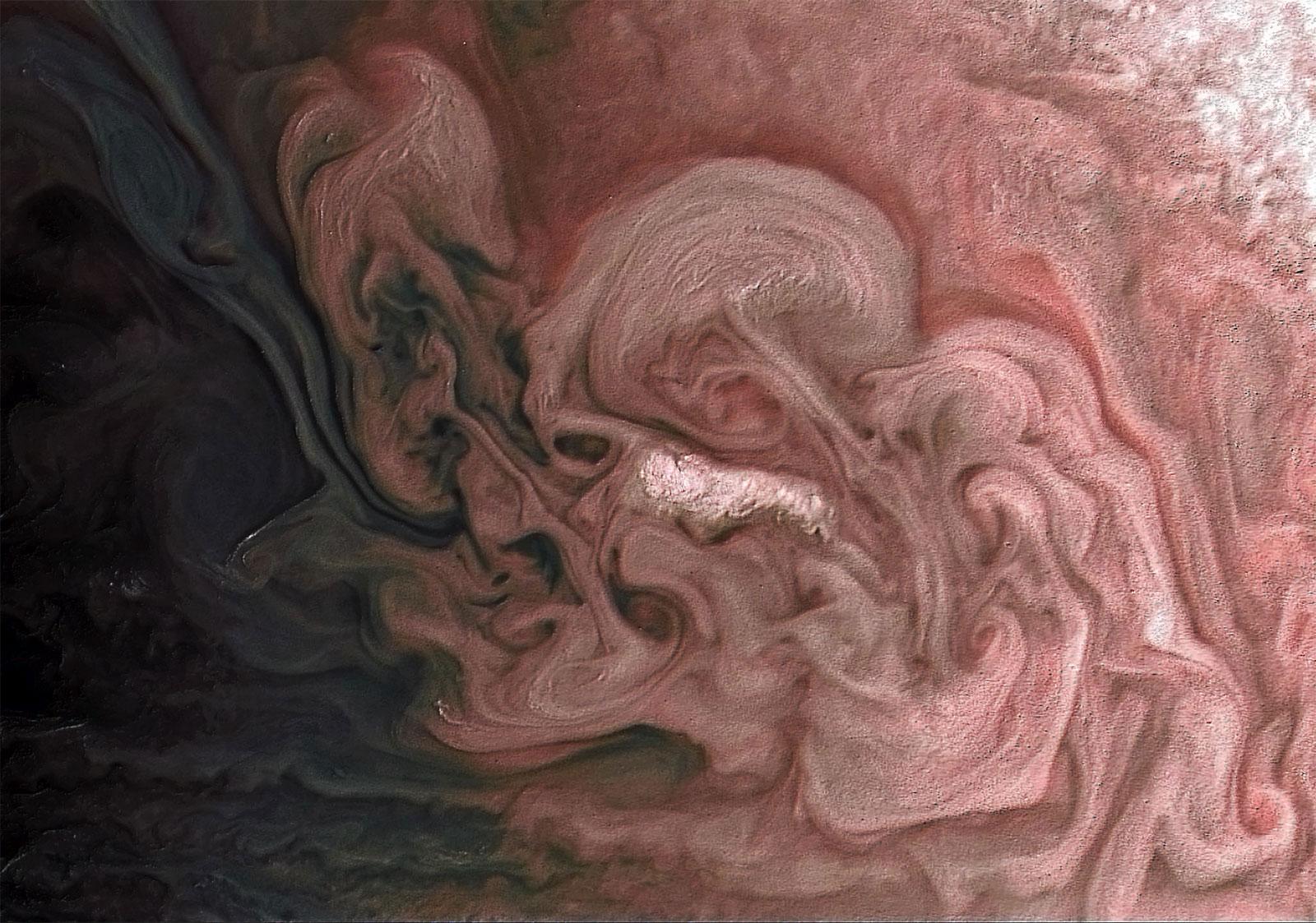 Juno was able to capture a Jupiter storm and emboss texture to allow scientists to understand the surface details.